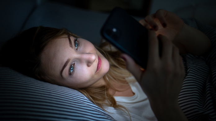 Woman unable to sleep because of blue light